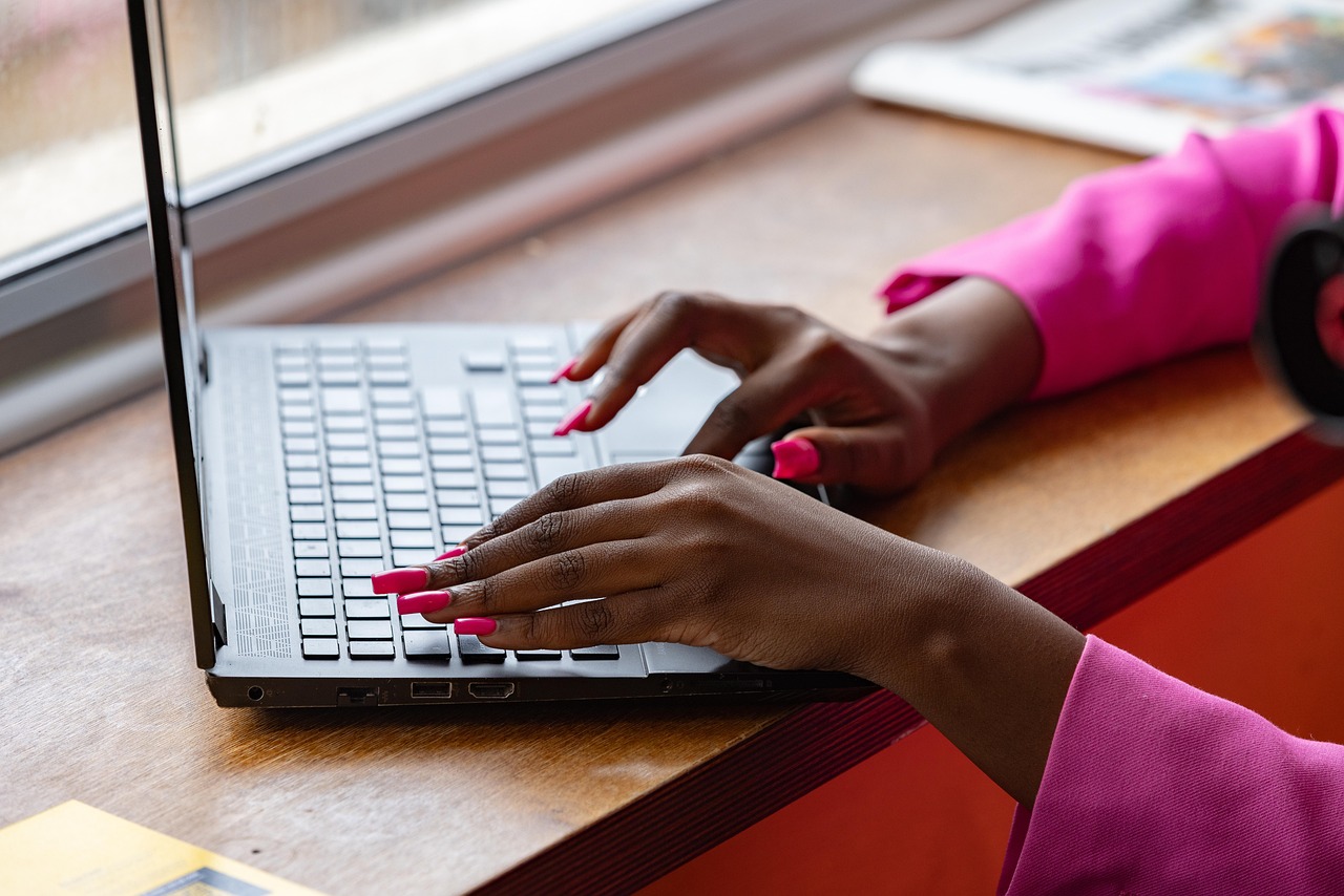 Laptop, typing, working — Can You Collect Social Security While Working?