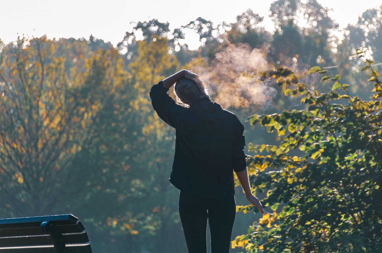 Woman, exercise, stretching — Manage Your Treatment Seamlessly Through Online Testosterone Therapy