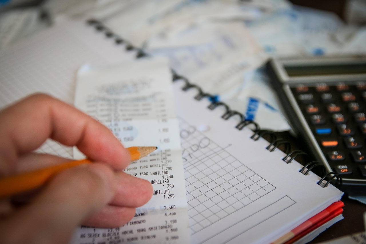Money, bills, calculator — The Legal Framework of Bail Bonds in Adams County